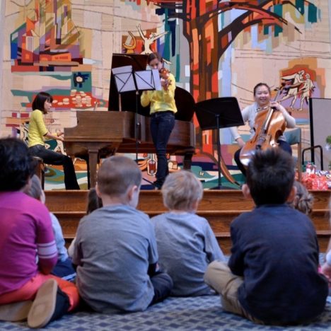 students watch musical performance