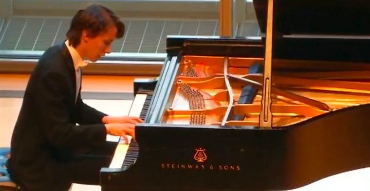 Arseniy Gusev playing piano