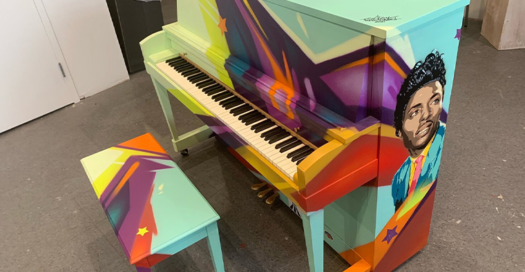 Graffiti HeArt’s piano at the Rock and Roll Hall of Fame.